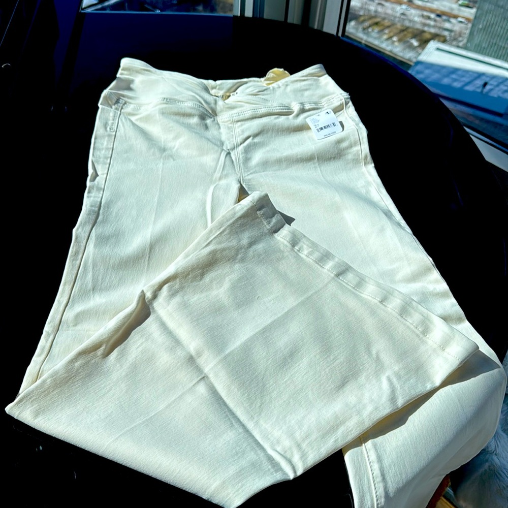 Cream colored wide leg jeans
